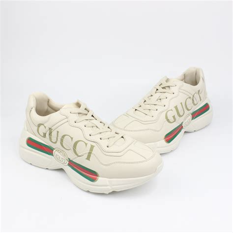 gucci rhyton logo sneaker|Gucci rhyton logo print.